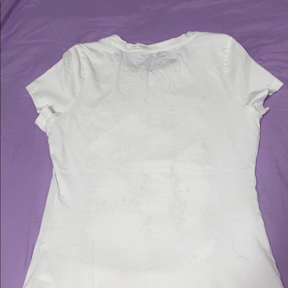 I am selling a white guess shirt.